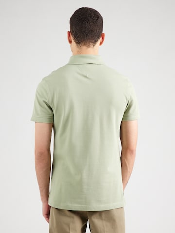 TOMMY HILFIGER T-shirt 'CORE 1985' i grön