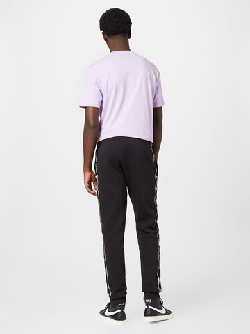 Champion Authentic Athletic Apparel Tapered Broek in Zwart