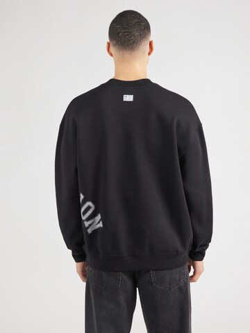 Champion Authentic Athletic Apparel - Sudadera en negro