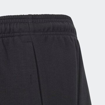 ADIDAS SPORTSWEAR Tapered Sports trousers 'Future Icons' in Black