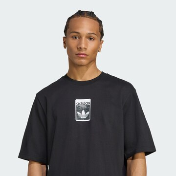 ADIDAS ORIGINALS Тениска 'Leo' в черно