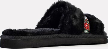 Minnetonka Slipper 'London' in Schwarz