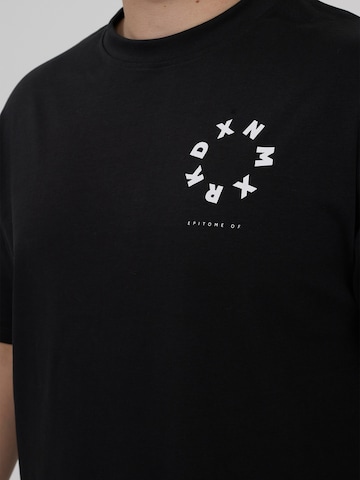 Maglia trikot 'Galal' di Dxnmxrk in nero