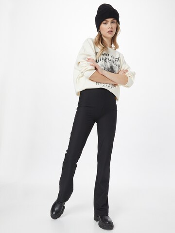 Gina Tricot Flared Trousers 'Aurora' in Black