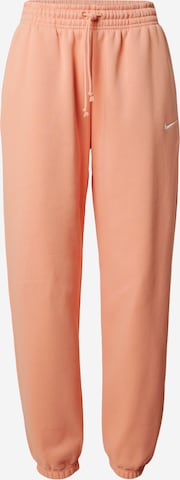 Tapered Pantaloni 'PHNX FLC' de la Nike Sportswear pe portocaliu: față