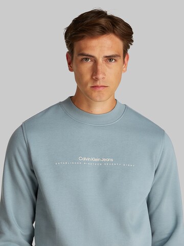 Sweat-shirt Calvin Klein Jeans en bleu