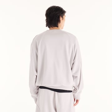 new balance - Sweatshirt 'Trackside French Terry Crew' em cinzento