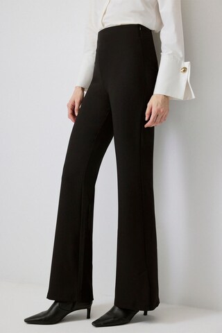 Touche Prive Boot cut Trousers in Black: front