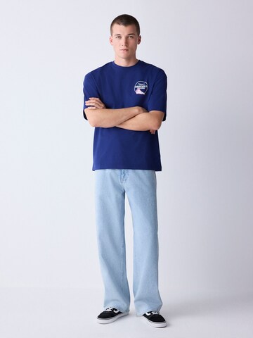 T-Shirt Next en bleu