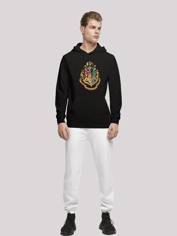 F4NT4STIC Sweatshirt 'Harry-Potter-Hogwarts-Crest-Gold' in Black