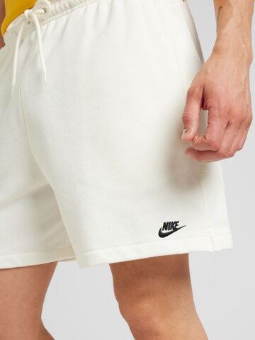Nike Sportswear Loose fit Trousers 'CLUB' in Beige