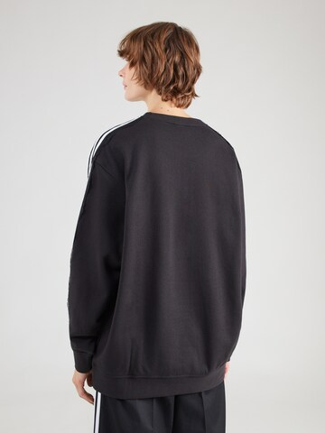 ADIDAS ORIGINALS Sweatshirt i svart