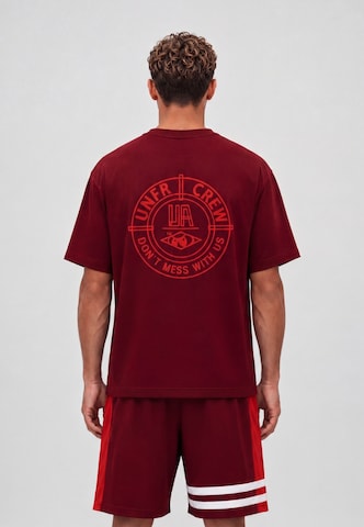 T-Shirt 'DMWU' Unfair Athletics en rouge : devant