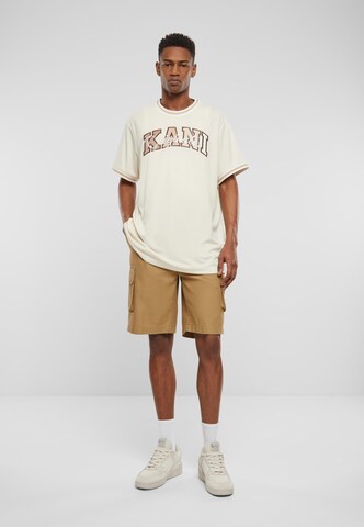 Regular Pantalon cargo Karl Kani en beige : devant