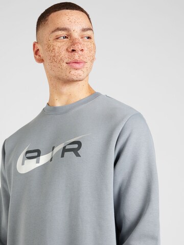 Nike SportswearSweater majica 'AIR' - siva boja