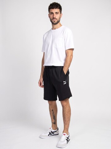 PUMA Baggy Hose‌‌‌‌‌‌‌‌ in Schwarz: Vorderseite