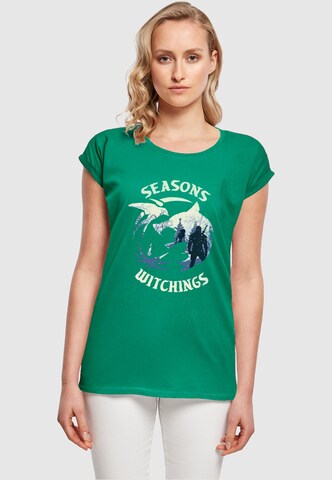 ABSOLUTE CULT Shirt 'Witcher - Christmas Wolf ' in Groen: voorkant
