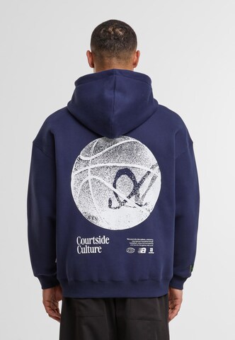 Veste de survêtement 'Courtside' Another Cotton Lab en bleu : devant
