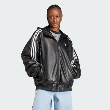 ADIDAS ORIGINALS - Chaqueta de entretiempo 'Adilenium' en negro