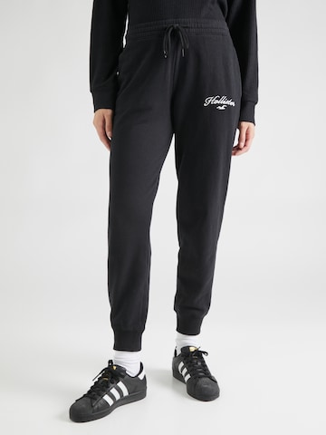 HOLLISTER Tapered Pants in Black: front