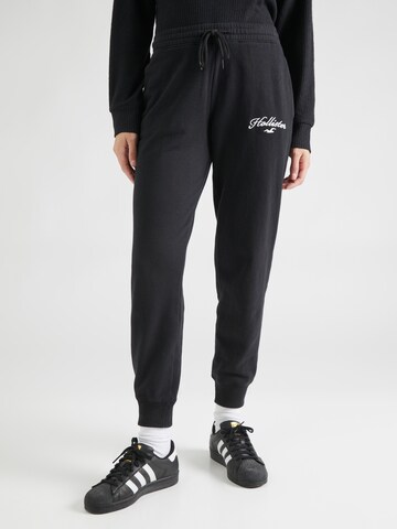 HOLLISTER Tapered Pants in Black: front