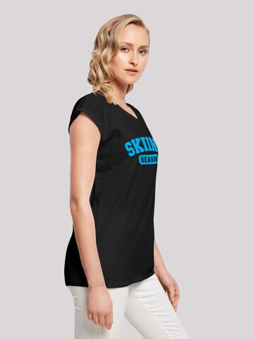 T-shirt 'Skiing Season Winter Sport' F4NT4STIC en noir