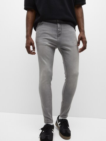 Pull&Bear Tapered Jeans in Grijs: voorkant