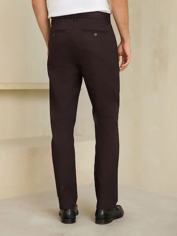 Next Slimfit Chinobyxa 'Motionflex' i lila