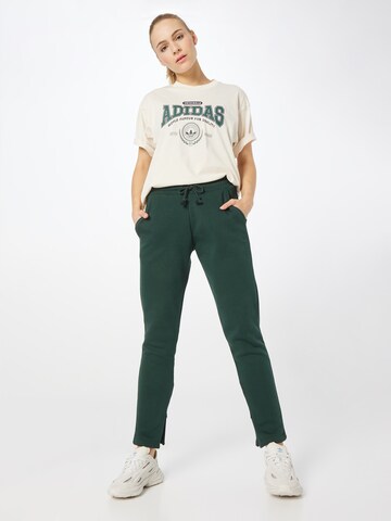 Slimfit Pantaloni sport 'All Szn Fleece Tapered' de la ADIDAS SPORTSWEAR pe verde