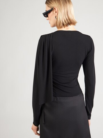 ABOUT YOU Tričko 'Reese' – černá