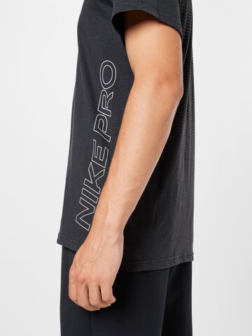 NIKE Sportshirt 'Burnout' in Schwarz