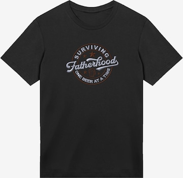 T-Shirt 'Surviving Fatherhood' F4NT4STIC en noir : devant