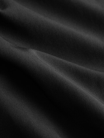 Slimfit Pantaloni funzionali di Next in nero