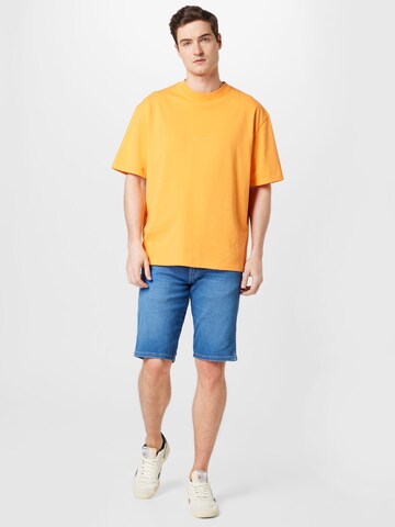 Pegador Tričko 'Colne' – oranžová
