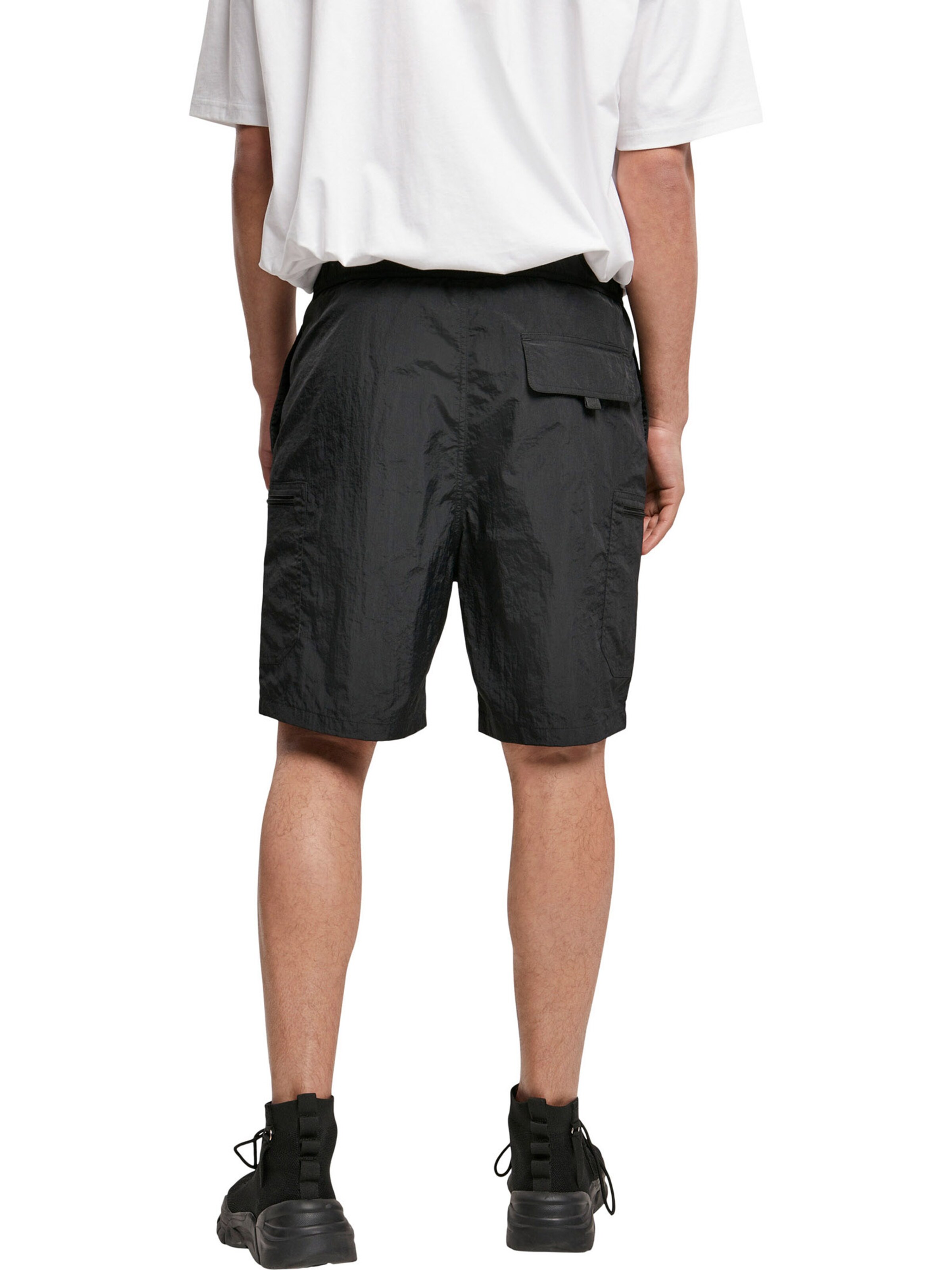 Urban Classics Свободный крой Штаны в Черный