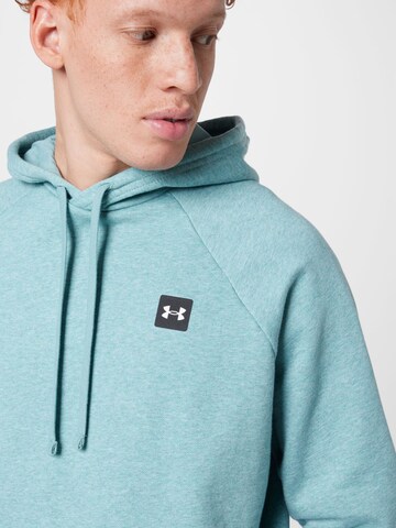 UNDER ARMOUR Regular fit Αθλητική μπλούζα φούτερ 'Rival' σε πράσινο