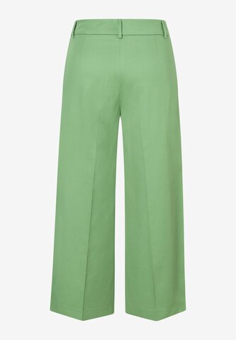 Wide leg Pantaloni con piega frontale di MORE & MORE in verde