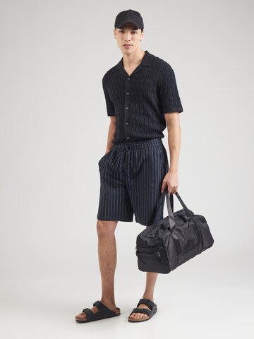 Only & Sons Loosefit Chinohousut 'ONSTINUS' värissä musta