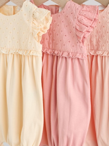 Next - Pijama entero/body en amarillo