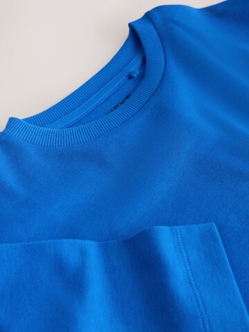 T-Shirt Next en bleu