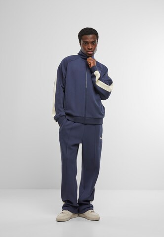 Veste de survêtement Karl Kani en bleu