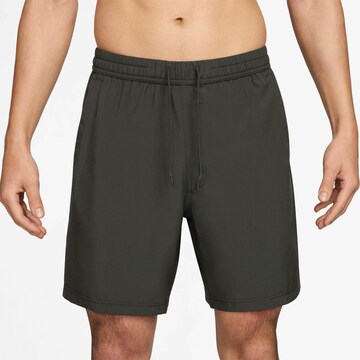NIKE Regular Workout Pants in Green