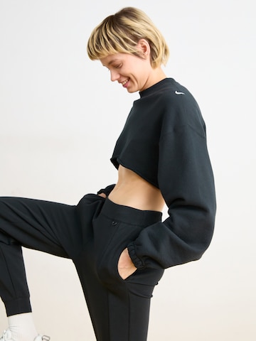 NIKE Tapered Sportbyxa '24.7' i svart