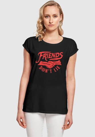 ABSOLUTE CULT T-Shirt 'Stranger Things - Friends Dont Lie' in Schwarz: Vorderseite