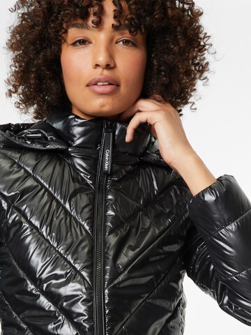 Calvin Klein Winter Jacket in Black | ABOUT YOU