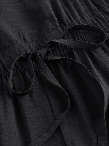 Combinaison Next en noir