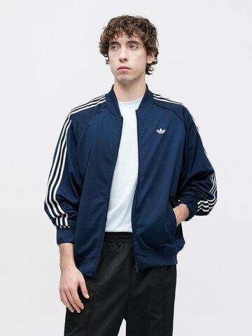 mėlyna ADIDAS ORIGINALS Demisezoninė striukė 'BRITCORE'