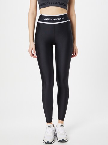 Skinny Pantalon de sport 'HeatGear' UNDER ARMOUR en noir : devant