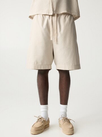 Pull&Bear Loose fit Trousers in Beige: front