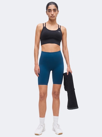 ICANIWILL Korzetová Sportovní podprsenka 'Define' – černá